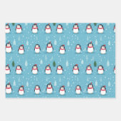 Feuille De Papier Cadeau Pingouins mignons en bleu clair avec des flocons d (Devant)