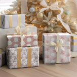 Feuille De Papier Cadeau Starfish Sand Dollar Rose Gold Rose Noël<br><div class="desc">Cet ensemble de 3 feuilles de papier d'emballage est parfait pour l'emballage cadeau de vacances côtier. Les motifs sur le thème de la plage de Noël comprennent : dollar de sable et étoiles de mer avec corail de parties scintillant rose or sur arrière - plan rose; dollars de sable blanc...</div>
