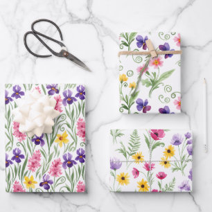 Feuille De Papier Cadeau Trois fleurs jaunes, roses et violettes différente