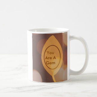 Feuille d'or, "vous êtes une tasse de gemme. "