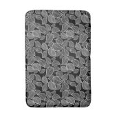 Feuilles blanches sur tapis de bain noir (Devant (Vertical))