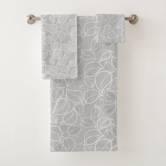 Feuilles blancs sur serviette gris argent (En situation)