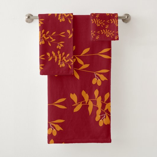 Feuilles de branches de silhouette orange sur roug (En situation)