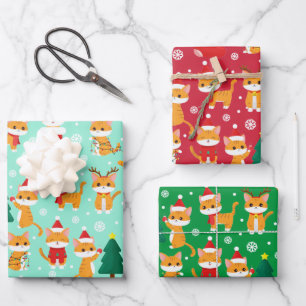 Feuilles de papier à envelopper de Noël de la peti