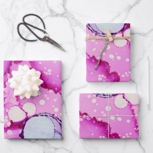 Feuilles de papier cadeau rose bleu violet abstrai
