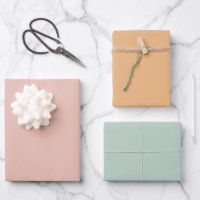 Feuilles de papier cadeau rose pastel orange vert