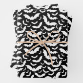 Feuilles de papier enveloppant des chauves-souris (En situation)