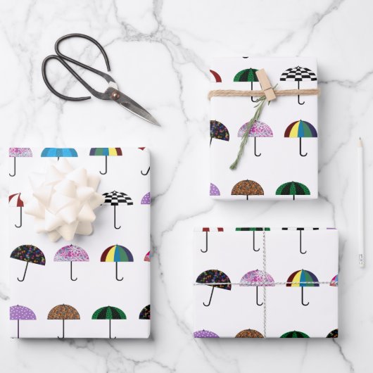 Feuilles de papier enveloppant des parapluies (Recto)