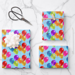 Feuilles de papier enveloppant les ballons d'anniv