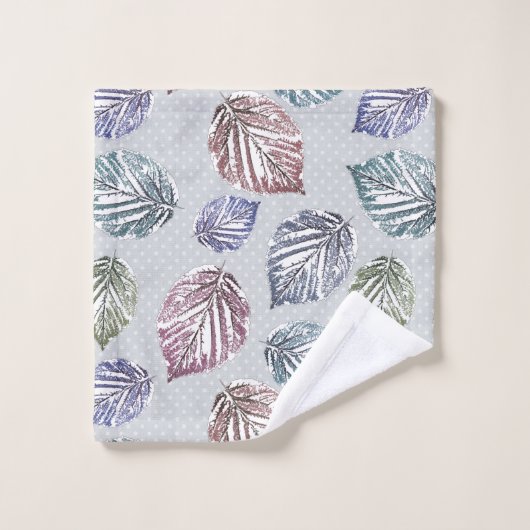 Feuilles d'open work sur un arrière - plan gris cl (Gant de toilette)