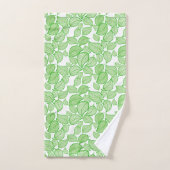 Feuilles verts sur la serviette blanche (Serviette à main)