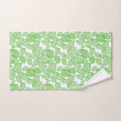 Feuilles verts sur la serviette blanche (Serviette à main)
