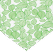 Feuilles verts sur nappes blanches (Angle)