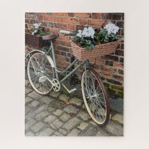 Fiets met bloemenmanden in het Engelse dorp Legpuzzel