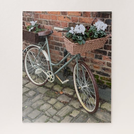 Fiets met bloemenmanden in het Engelse dorp Legpuzzel (Verticaal)