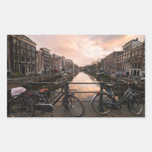 Fietsen op zonsondergang in Amsterdam Rechthoekige Sticker