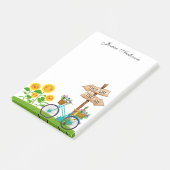 Fietsprogramma met mand bloemen na de presentatie post-it® notes (Schuin)