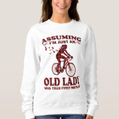 Fietsvrouw veronderstelt dat ik gewoon een oude da trui (Voorkant)