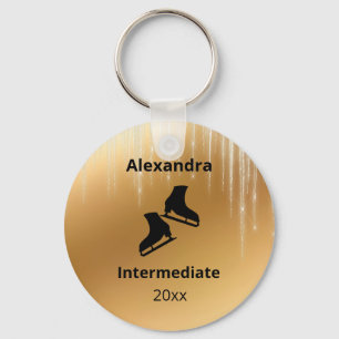 Figuur schaatstest jaars gouden sleutelhanger