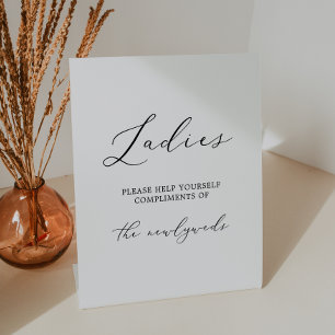 Fijne zwarte kalligrafie dames badkamer reclamebord met voetstuk