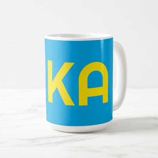 FIKA Bold Geel en Blauw Koffiemok (Voorkant rechts)