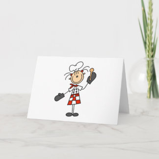 Fille de chef avec les cartes en bois de cuillère