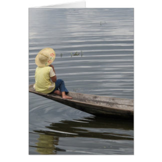 Fille en bateau à Inle Lake