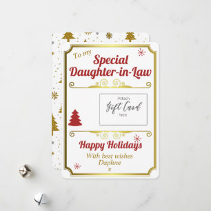 Fille en droit Détenteur de carte cadeau de Noël