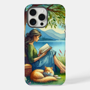 Fille lisant un livre sous un arbre avec un chat e