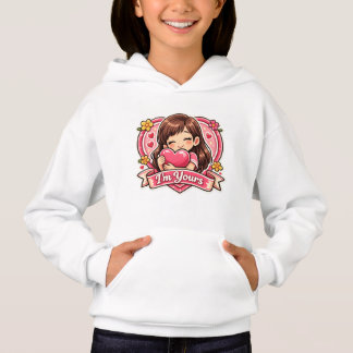 Fille mignonne serrant un sweat-shirt à cœur