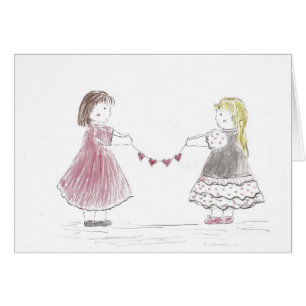 Filles tenant la chaîne de coeur