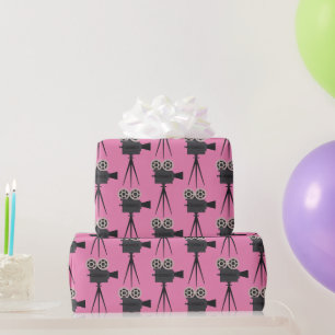 Filmcamera's op roze terugzetten cadeaupapier