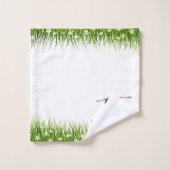 Flamant rose rose et prairie avec fleurs sur chauv (Gant de toilette)