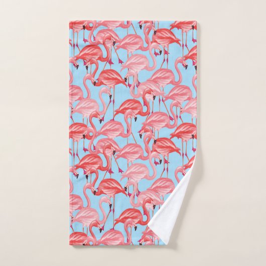 Flamants roses roses lumineux sur le bleu (Serviette à main)
