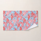 Flamants roses roses lumineux sur le bleu (Serviette à main)
