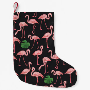 flamingo vogel met monstera palmbladeren patroon. kleine kerstsok