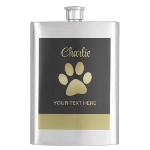 Flasque Paw chien brillant or sur arrière - plan noir