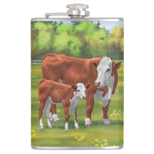 Flasques Hereford Cow & Cute Calf dans les pâturages d'été