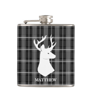 Flasques Tête de mâle sur le plaid noir et blanc