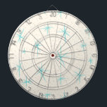 Fléchettes Cible de flechettes de Starbursts de turquoise<br><div class="desc">Les starbursts bleus de caractéristiques de ce d'espace d'âge de turquoise de Starbursts motif de Cible de flechettes sur un arrière - plan crémeux avec de l'or coloré tachette. Inspiré par un motif moderne de plat de la moitié du siècle classique, cette conception a un talent vintage authentique. La rétro...</div>