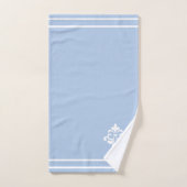 Fleur blanche, monogramme et rayures sur fond bleu (Serviette à main)