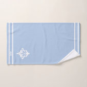Fleur blanche, monogramme et rayures sur fond bleu (Serviette à main)