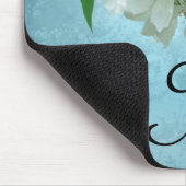 Fleur blanche sur le tapis de souris bleu (Coin)