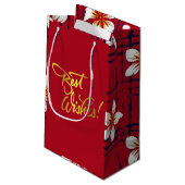 Fleur blanche sur sac cadeau rouge et bleu (Dos Angle)