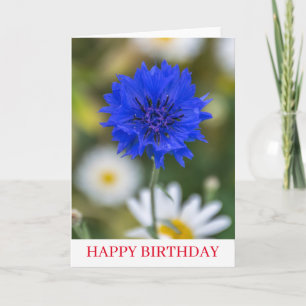 Fleur de corail bleu près de la carte d'anniversai