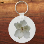 Fleur de magnolia blanche sur un porte-clés (Recto)
