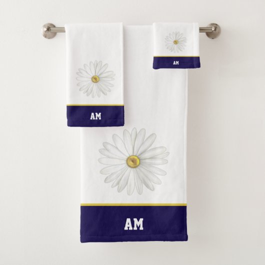 Fleur de marguerite et monogramme sur serviettes d (En situation)