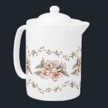 Fleur sauvage Garden Tea Party<br><div class="desc">Cette belle théière a une fine bordure de vigne feuillue sur le dessus et le fond avec des fleurs sauvages roses qui traversent le centre. Les couleurs comprennent le vert sauge,  le rose pâle et le marron.</div>