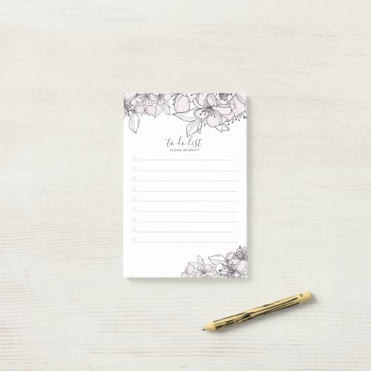 Fleurs à main floues Notes post-it botaniques (Sur un bureau)