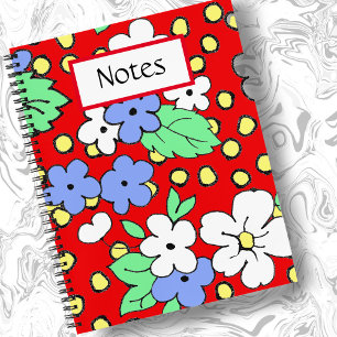 Fleurs blanches et bleues sur carnet en spirale ro